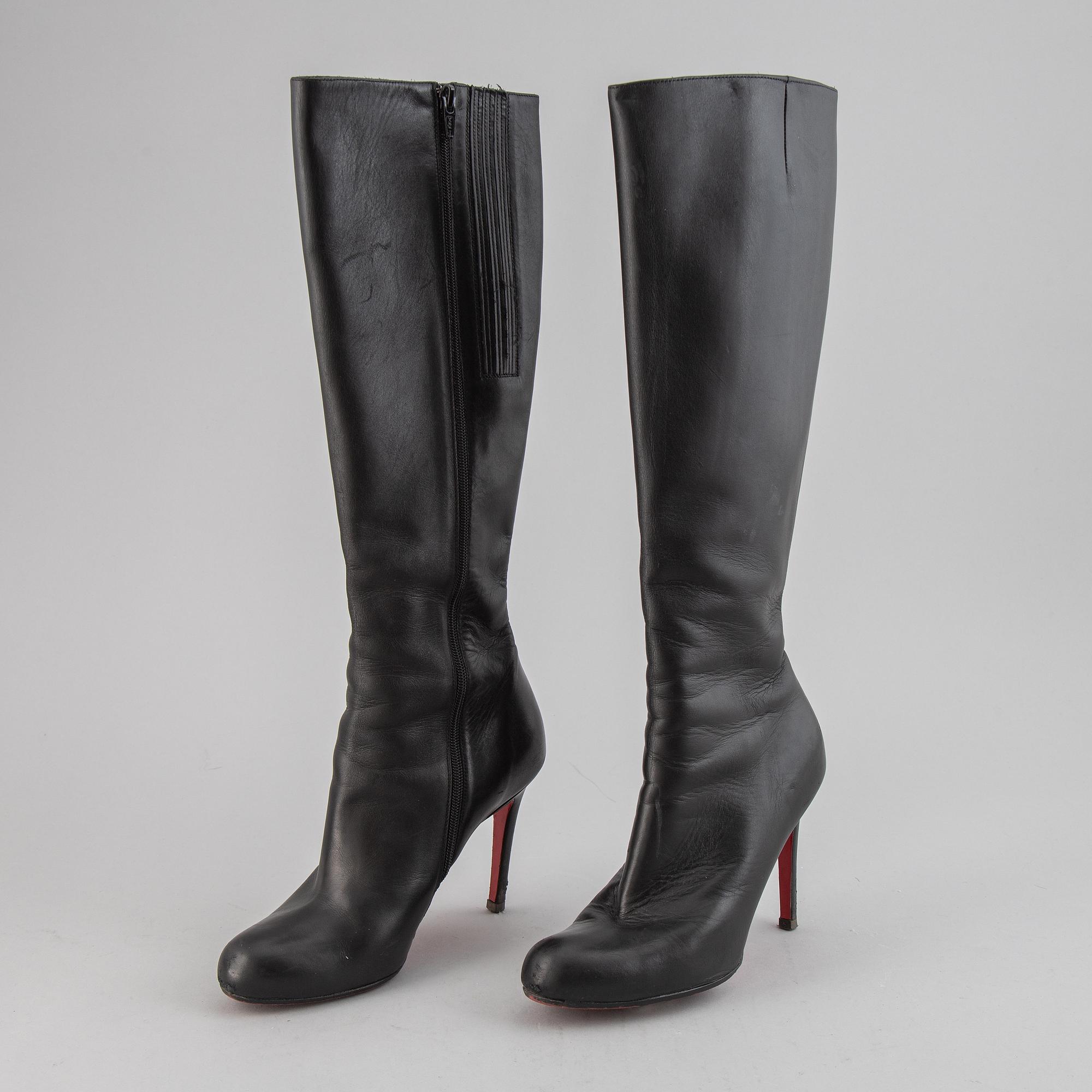 CHRISTIAN LOUBOUTIN, a pair of leather boots, size 37.