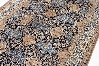 A semi-antique Nain carpet, part-silk, c. 261 x 175 cm.