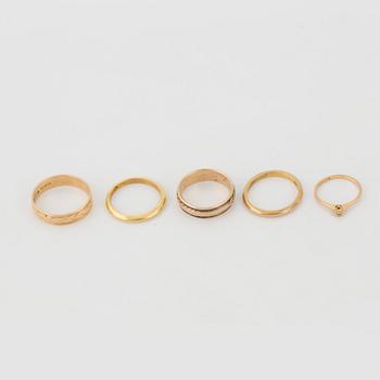 RINGS, five items, 18K gold, one with diamond.