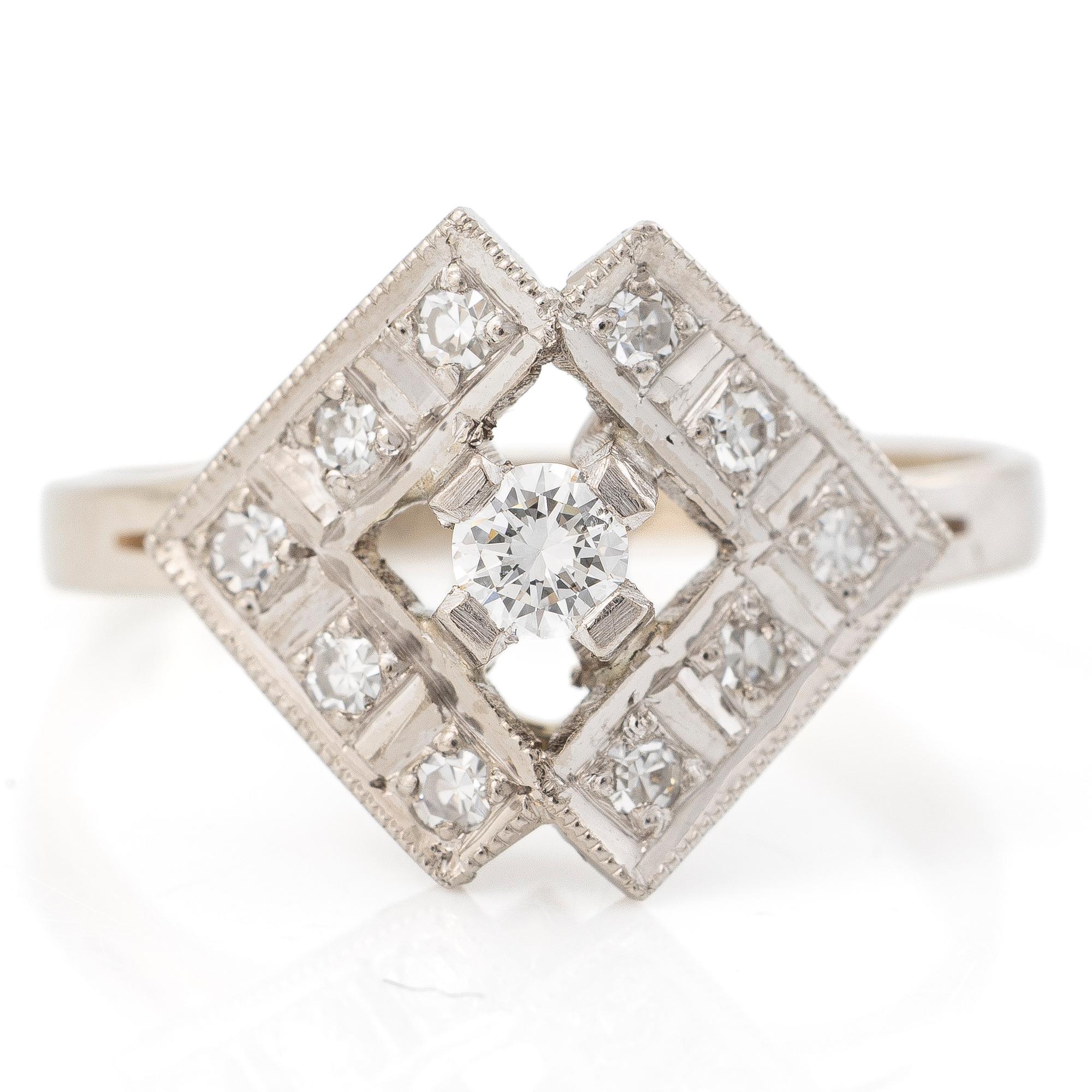 18K white gold ring set with brilliant-cut and single-cut diamonds, A. Koru 1981.