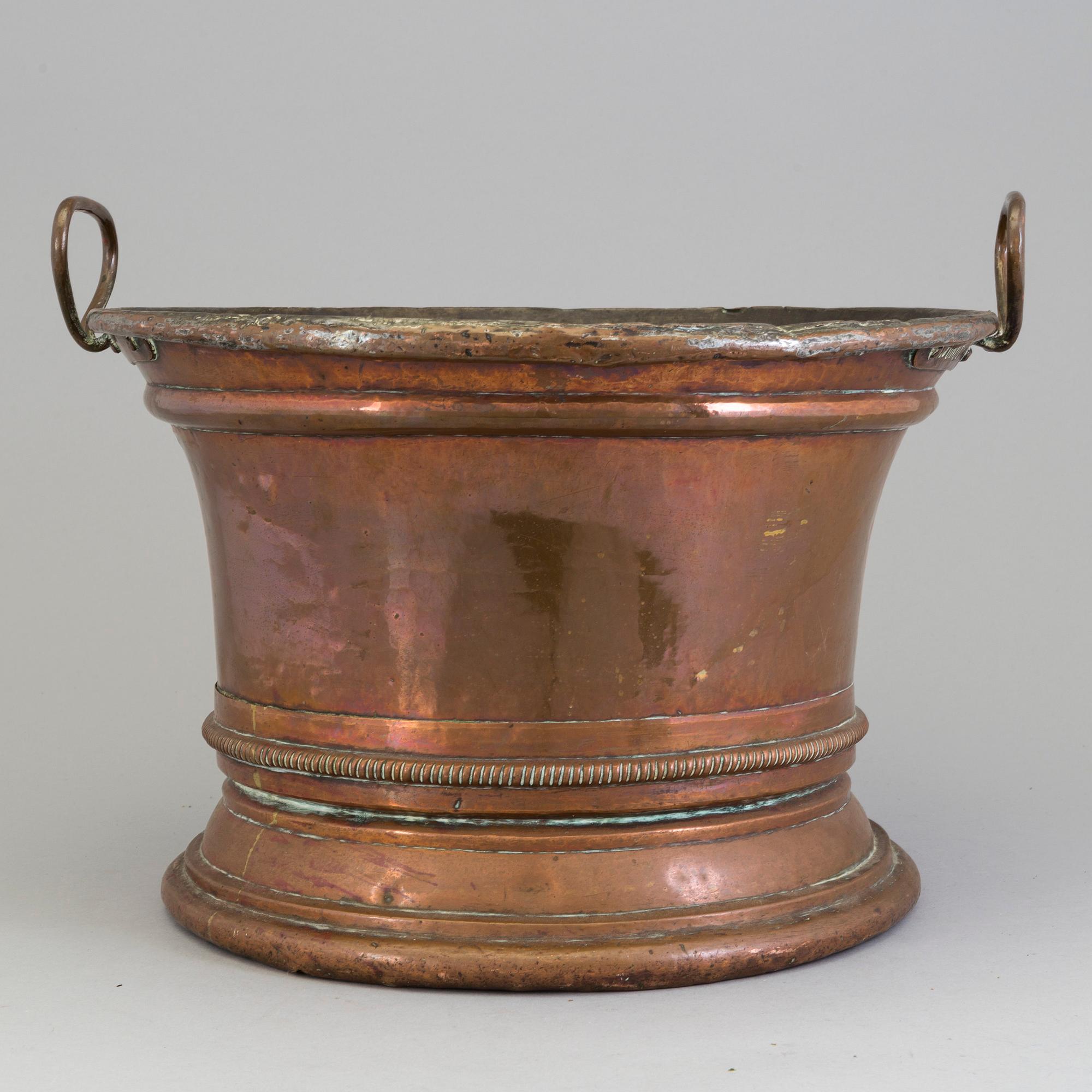 An 18th century copper wine cooler.