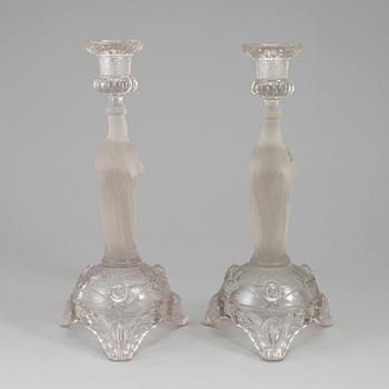A pair of moulded glass candlesticks, late 19th century.