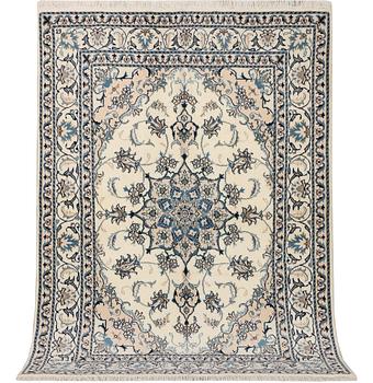 A Nain part silk rug, c. 193 x 148 cm.