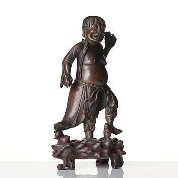 A bronze sculpture of Liu Hai, Qing dynasty, 19th century.