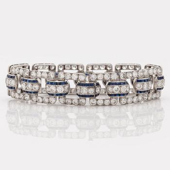 An Art Deco step cut sapphire and  old- cut diamond bracelet.