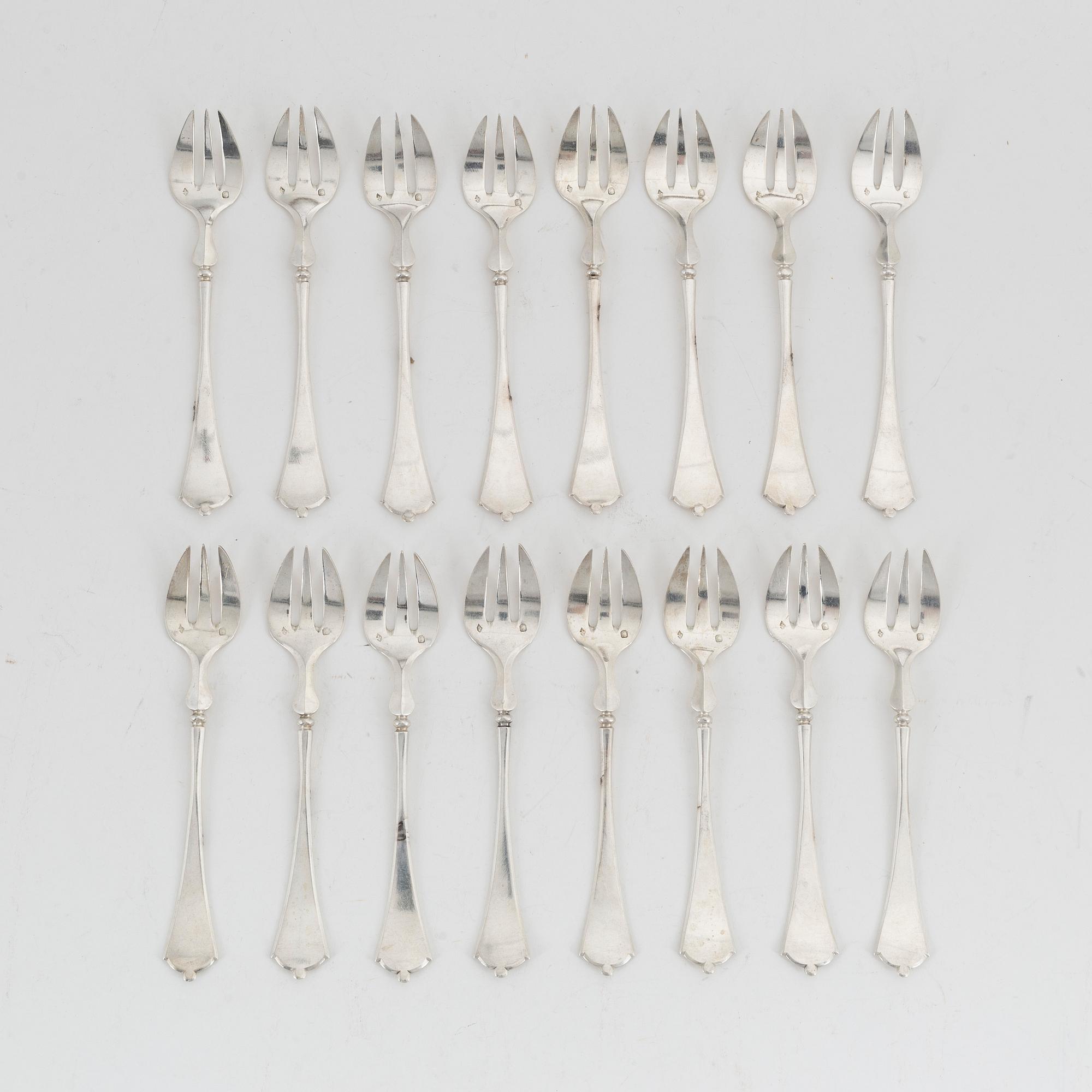 A set of 16 French silver 950 oyster forks, Paris circa 1900.