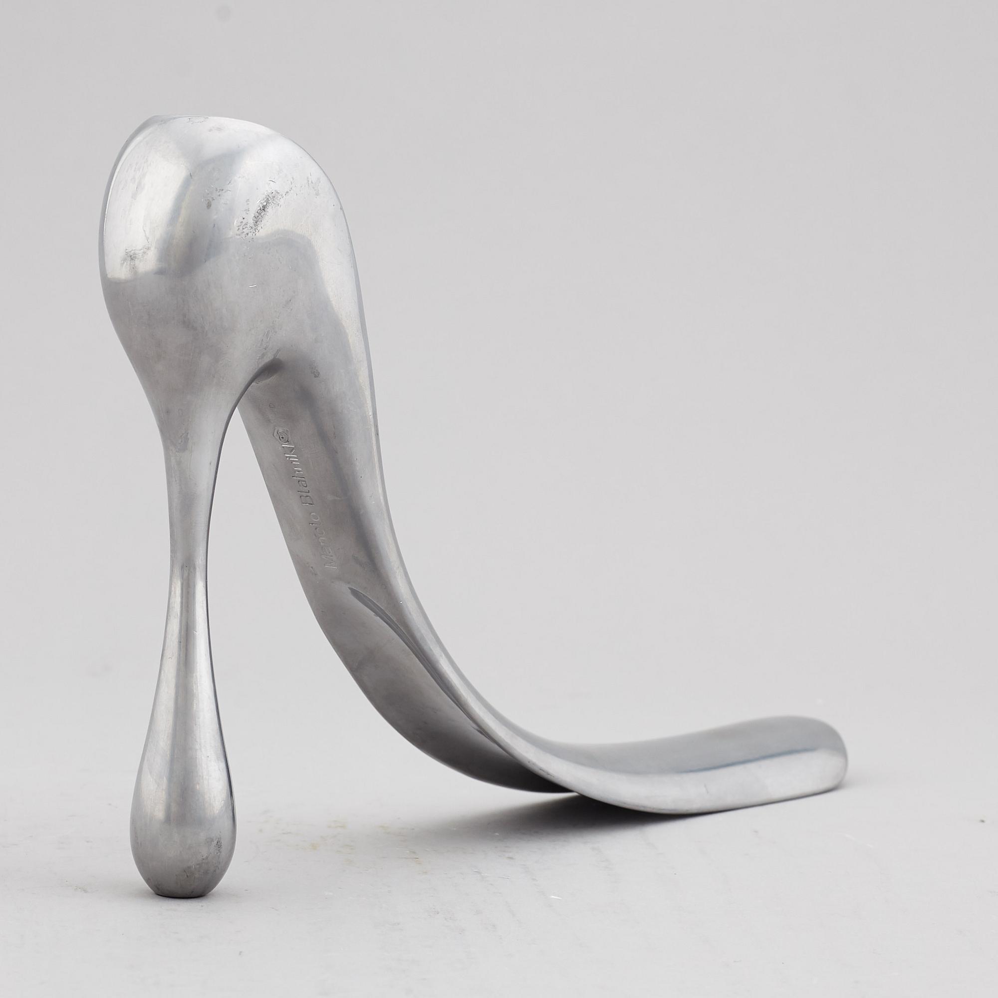 A Manolo Blahnik shoe horn, modern.