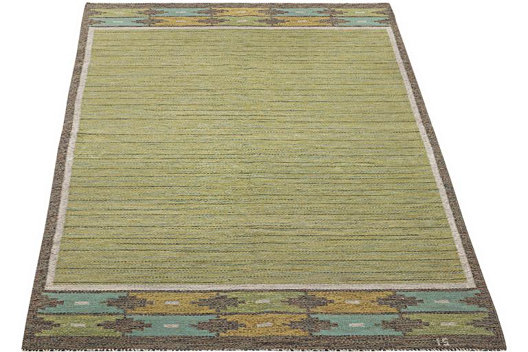 Ingegerd Silow, a flat weave rug, signed IS, c. 242 x 154 cm.