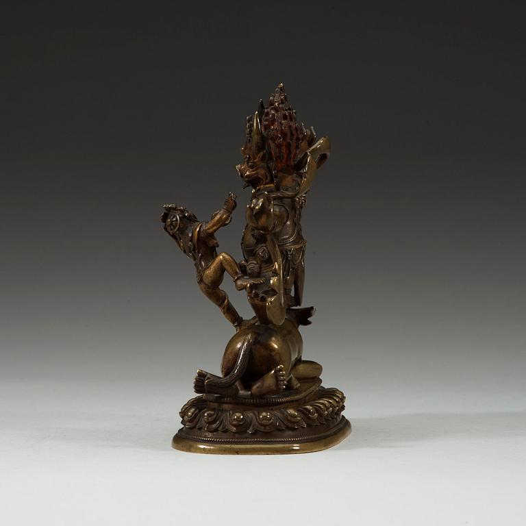 A Mongolian bronze figure of a Dharmapala, early 19th century.