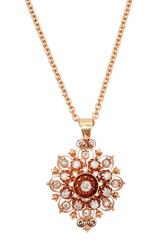 A DIAMOND PENDANT WITH CHAIN.