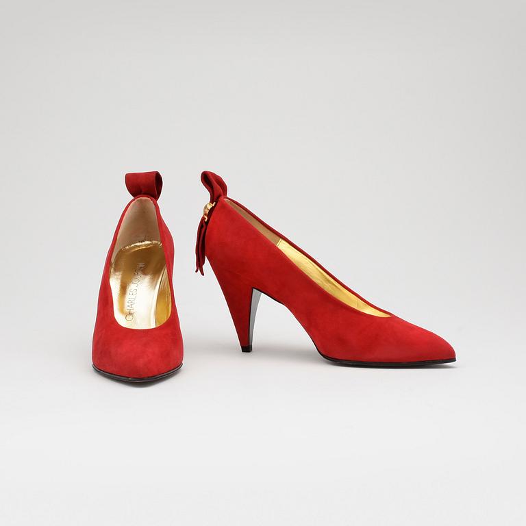 CHARLES JOURDAN, a pair of red suede pumps with matching shoulder bag.