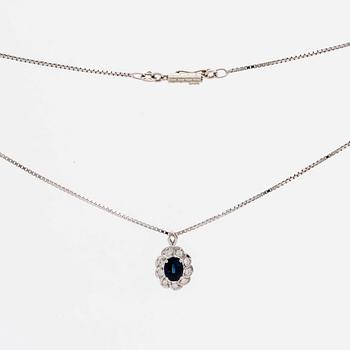 PENDANT and chain 18K whitegold 1 sapphire approx 6 x 4 mm and brilliant-cut diamonds approx 0,25 ct in total.