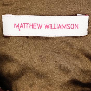 MATTHEW WILLIAMSON, a moss green silk tunic.