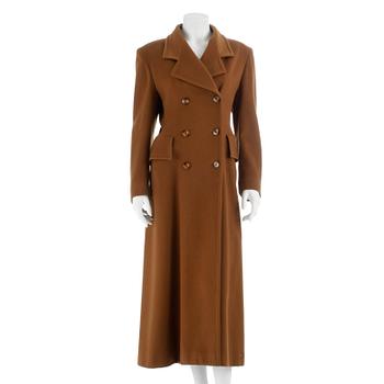 628. GUY LAROCHE, a camelbrown wool coat.