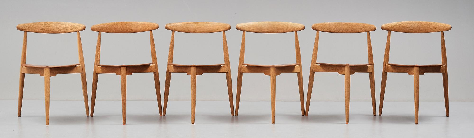 HANS J WEGNER, a "Heart set", a dining table with six chairs, Fritz Hansen, Denmark 1950's.