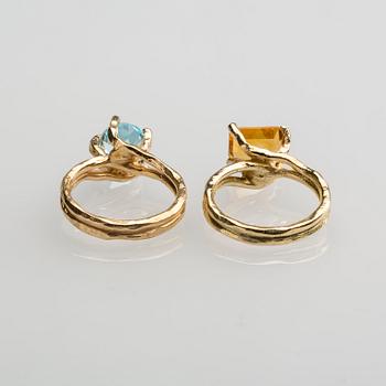 RINGAR, 2 st, 18 k guld, topas ca 2.00 ct samt citrin ca 2.50 ct. Totalvikt ca 12 g.