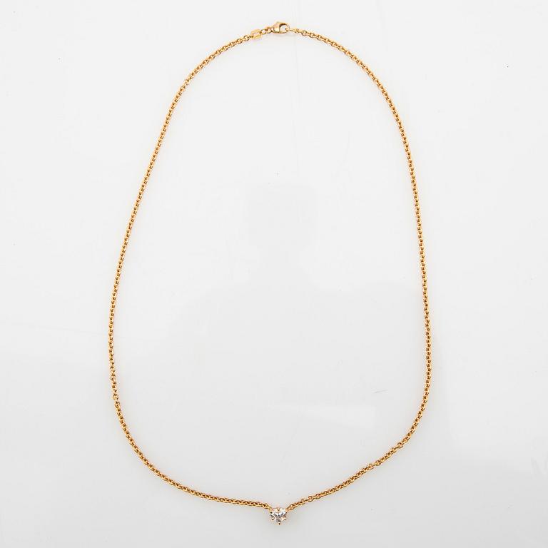 Necklace, 18K gold with heart-shaped diamond.