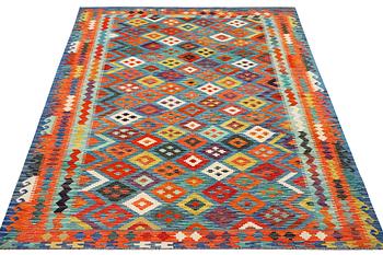 A Kilim carpet, c. 297 x 197 cm.
