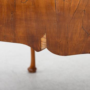 A George II walnut partner's desk, mid 18th century.
