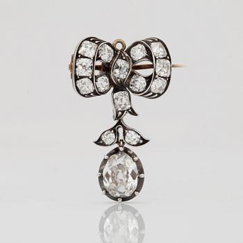 BROSCH/HÄNGE med gammalslipade diamanter totalt ca 16.00 ct.
