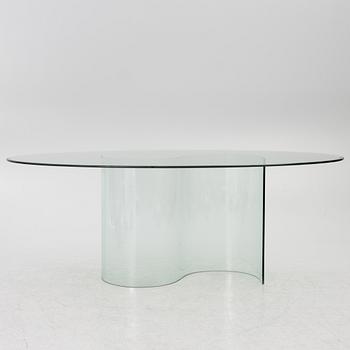 A dining table, glass, contemporary.