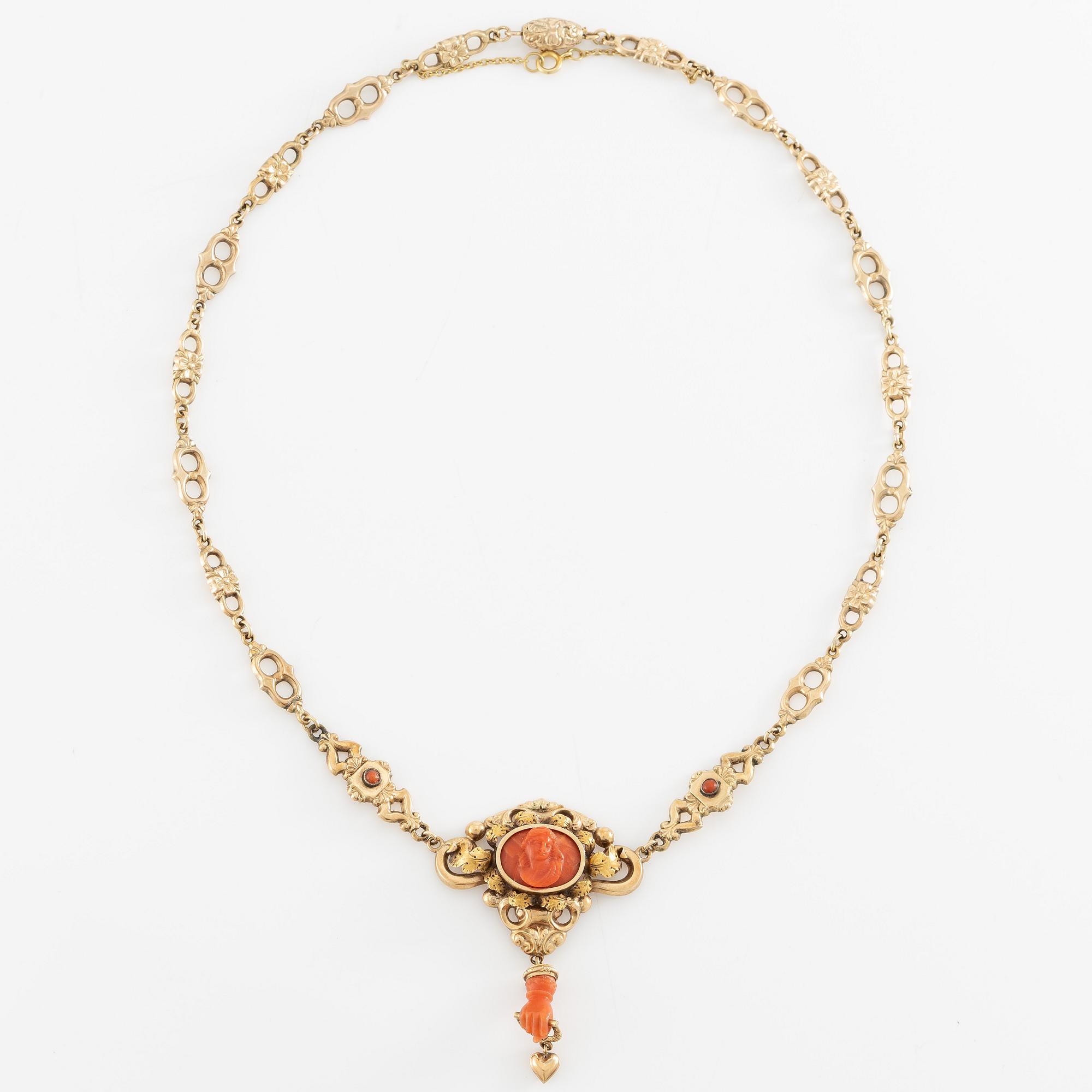 Necklace in 14K gold with carved coral. Probably around the turn of the century 1900.