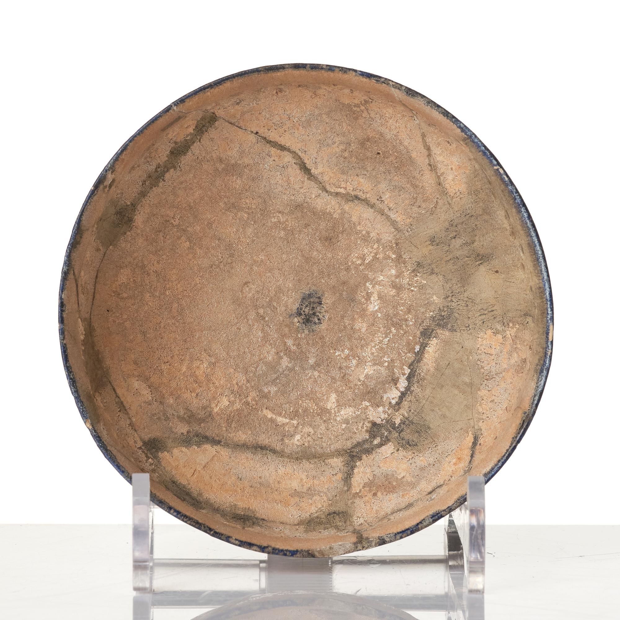 A central Asian pottery bowl,  13th century.