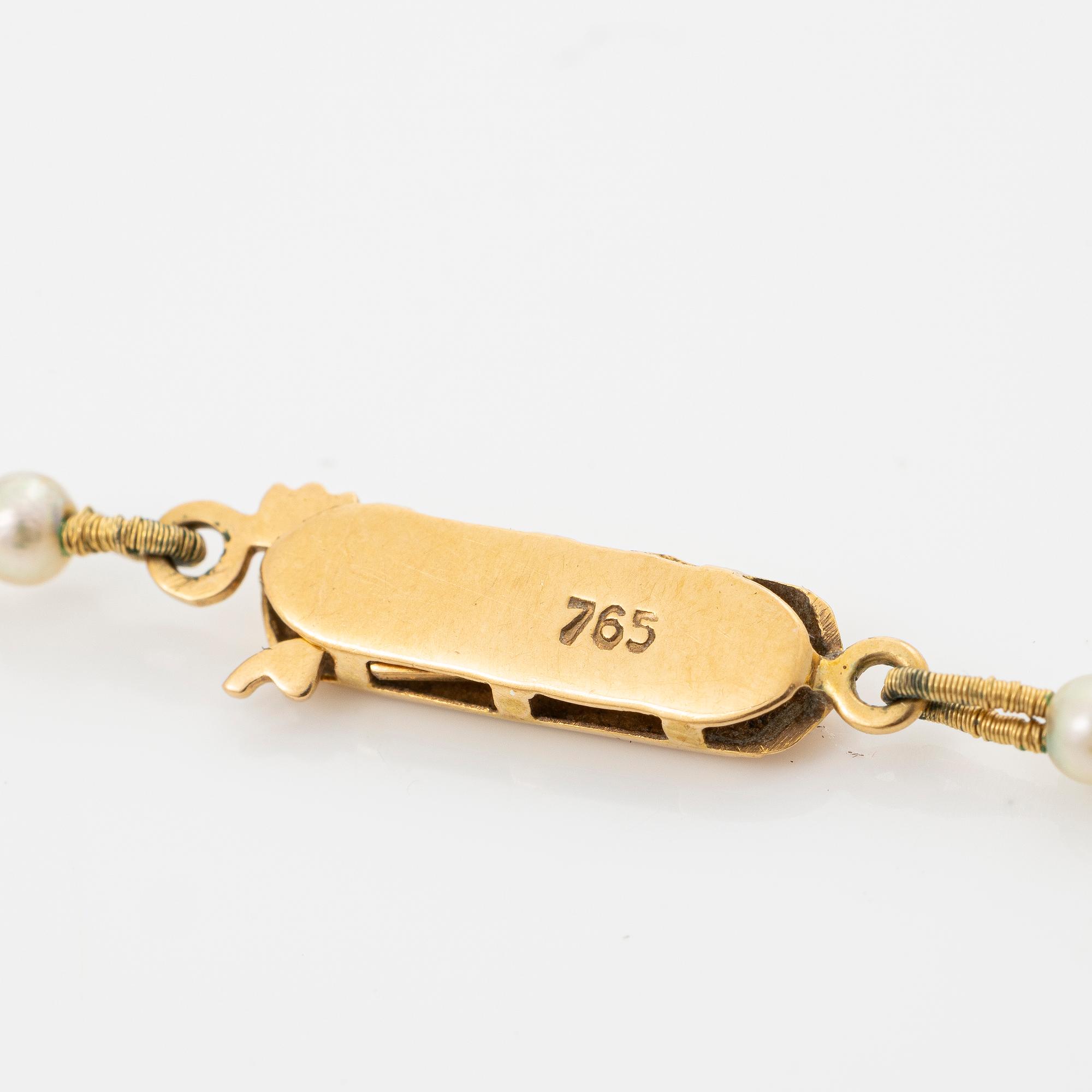 Collier odlade pärlor lås 18K guld.
