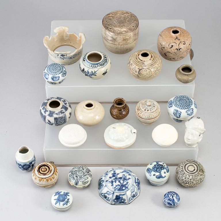A group of 24 Southeast asian ceramic jars and boxes, 18-19th century.
