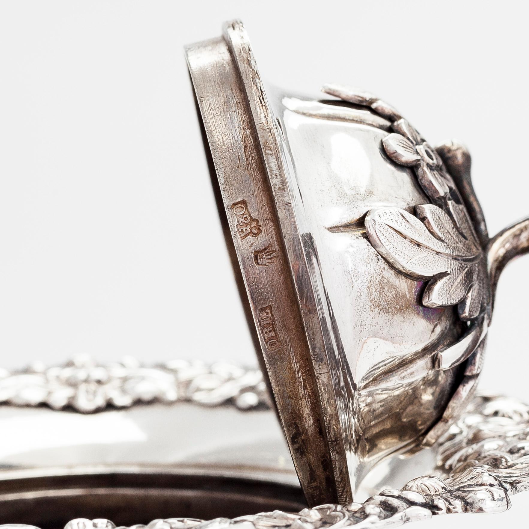 A silver coffee pot, and silver cream jug, Olof Robert Lundgren, Turku 1847 and Fredrik Strömsten, Helsinki 1839.