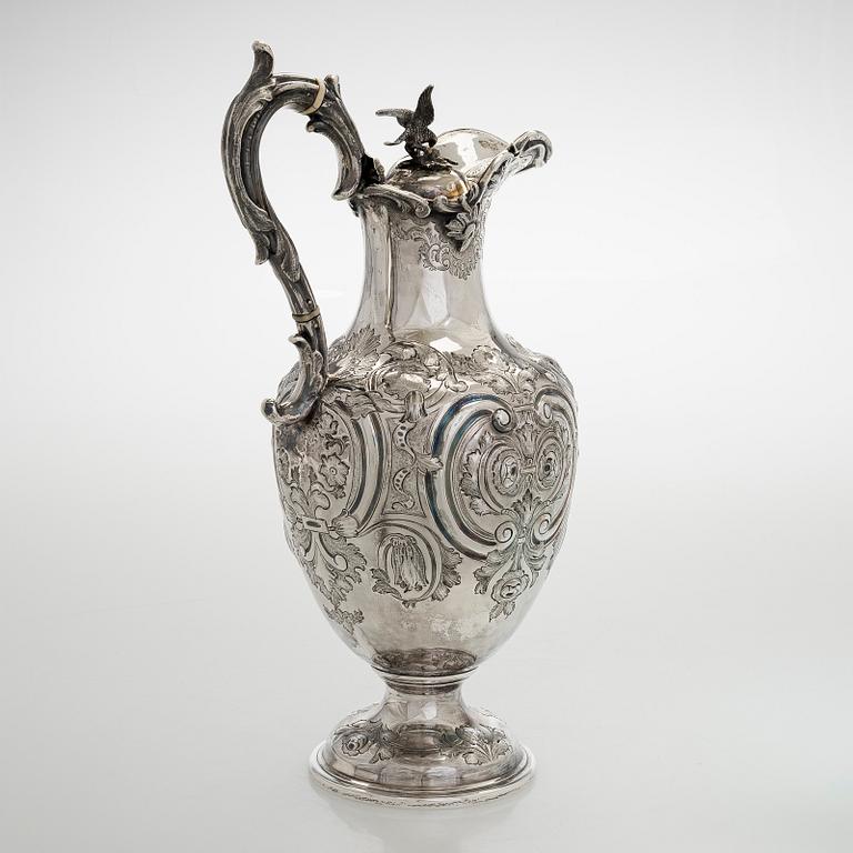 A sterling silver jug, maker's mark of Martin, Hall & Co, Sheffield 1877.