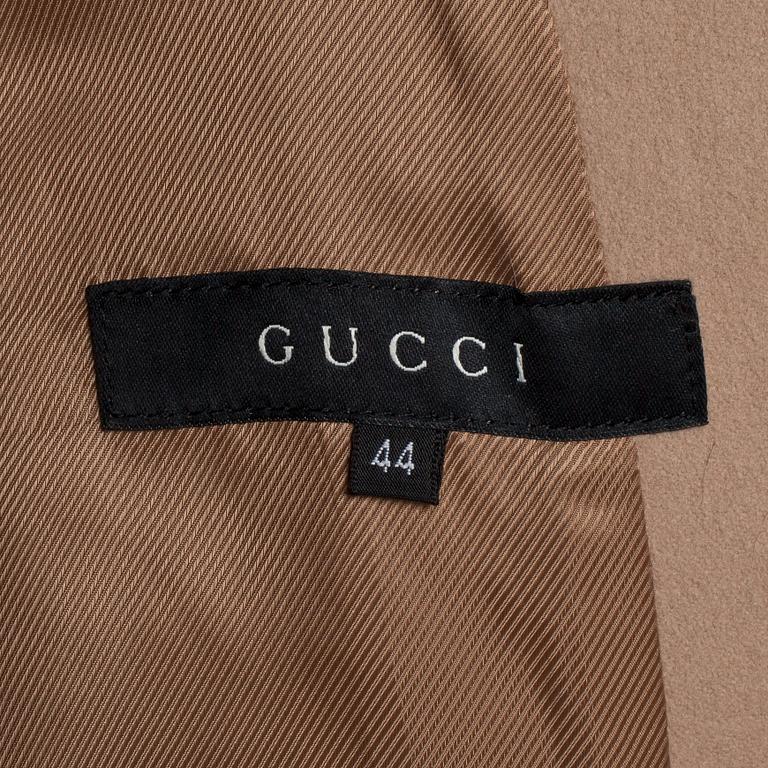 GUCCI, a beige wool and cashmere jacket.