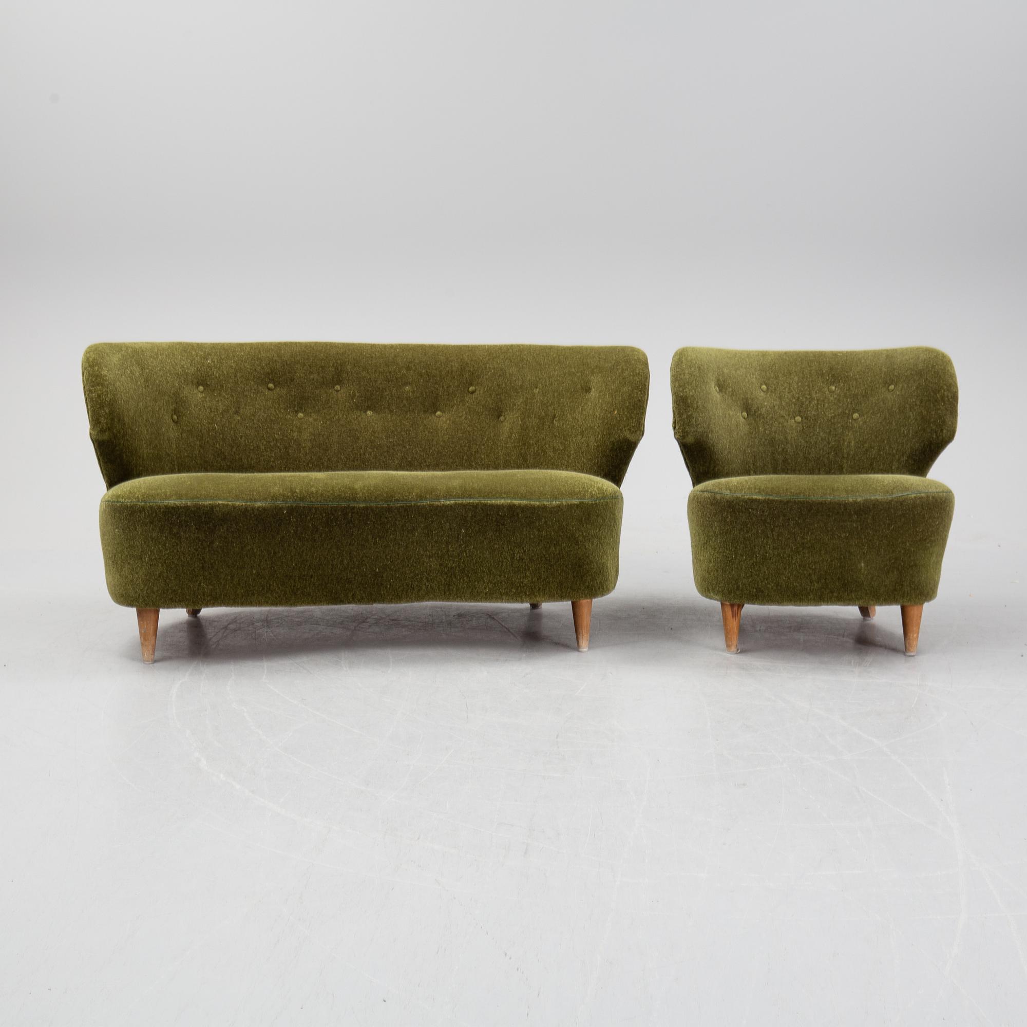 A sofa and easy chair, 1940s/50's.