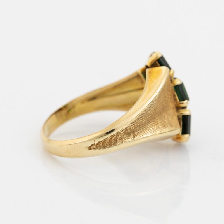 14K gold and green torumaline ring.