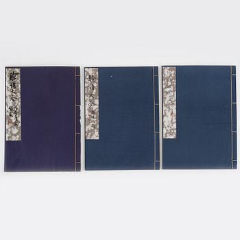 A book in three volumes about teatrical make up designs, 20th Century.