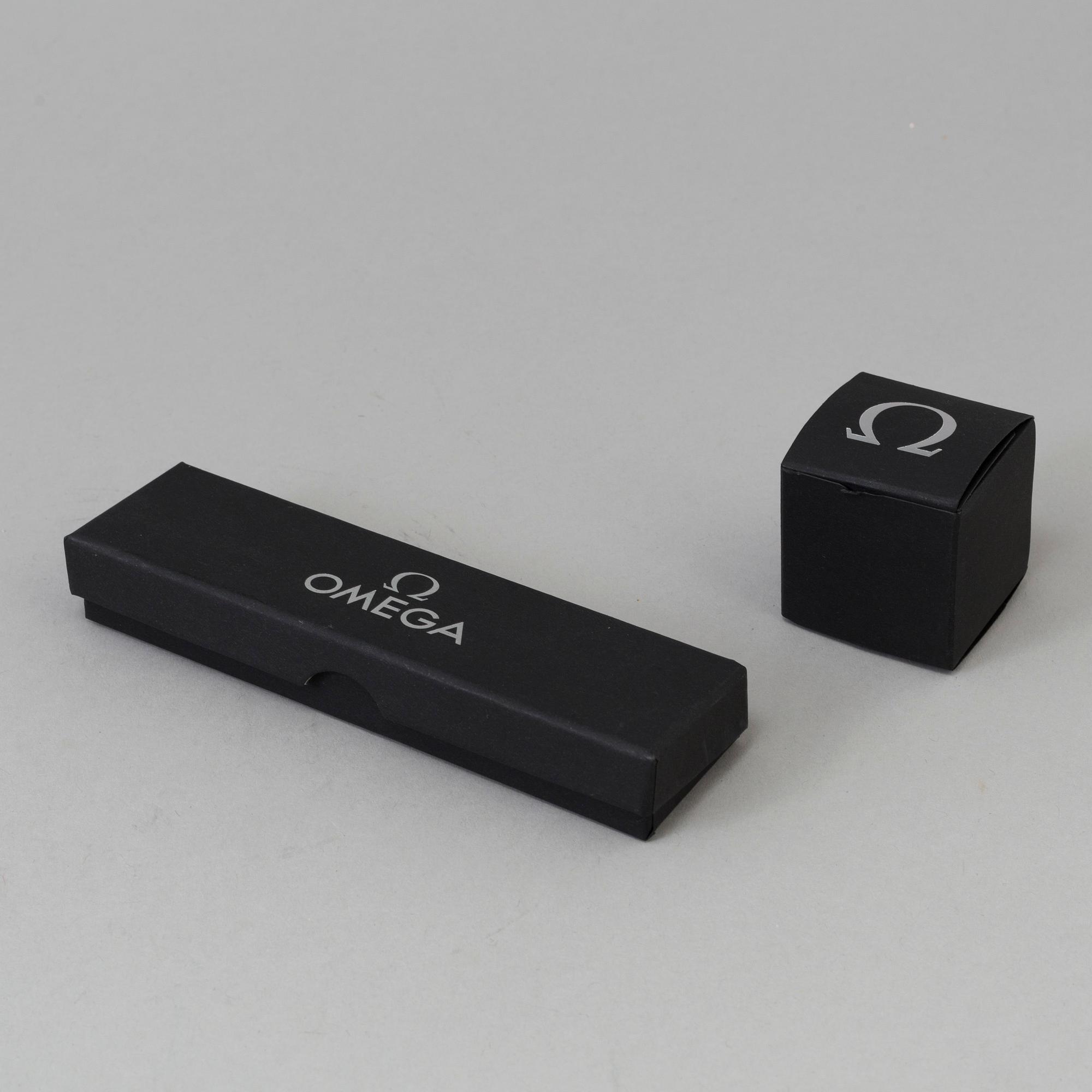 OMEGA, Pen / Loupe / Velcro strap.