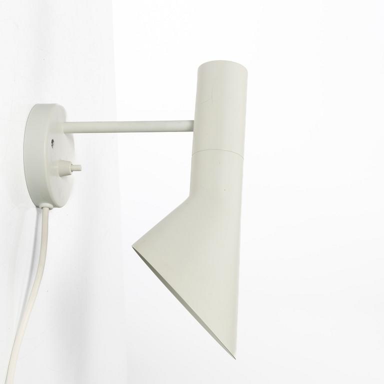 Arne Jacobsen, An 'AJ' wall lamp. Louis Poulsen, 21st century.