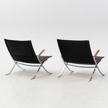 A pair of  'X-chairs' by Preben Fabricius & Jørgen Kastholm, designed 1968.