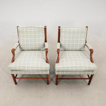 Arne Norell, a pair of Gripsholm model armchairs, later part of the 20th century.