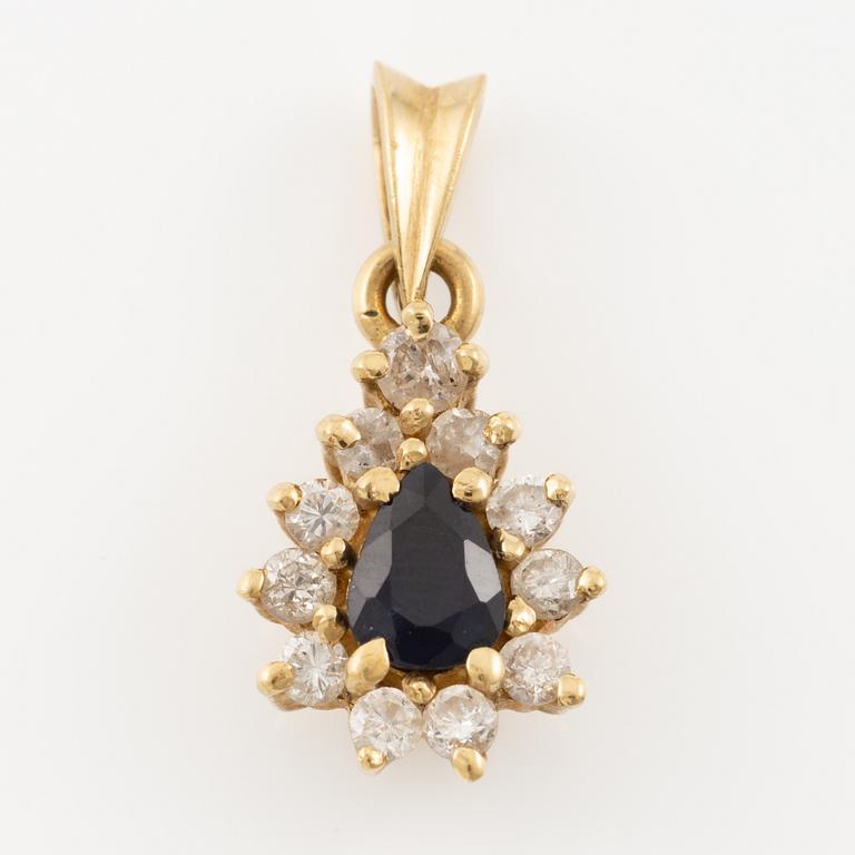 Pendant, 18K gold, set with a sapphire and brilliant-cut diamonds.
