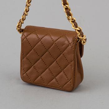 CHANEL, "flapbag micro" 1989-1991.