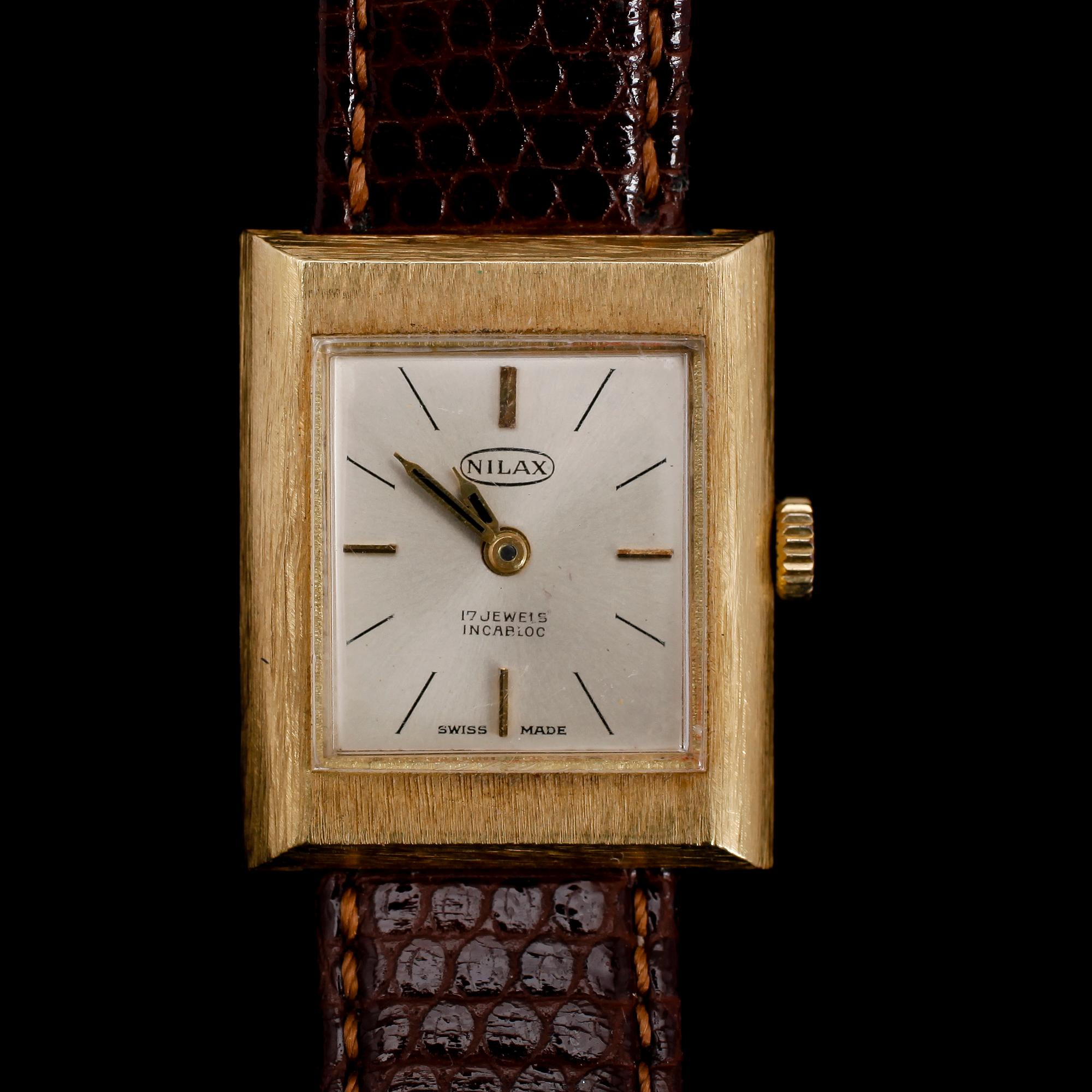 ARMBANDSUR, 18 k guld, Nilax.