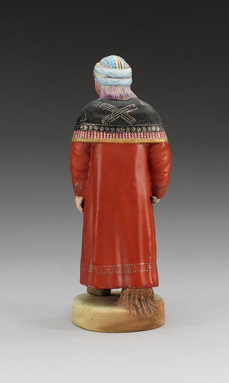 A Russian bisquit figure of a Khanty woman, Gardner (Dimitrovsk Porcelain Manufactory 1929-34),