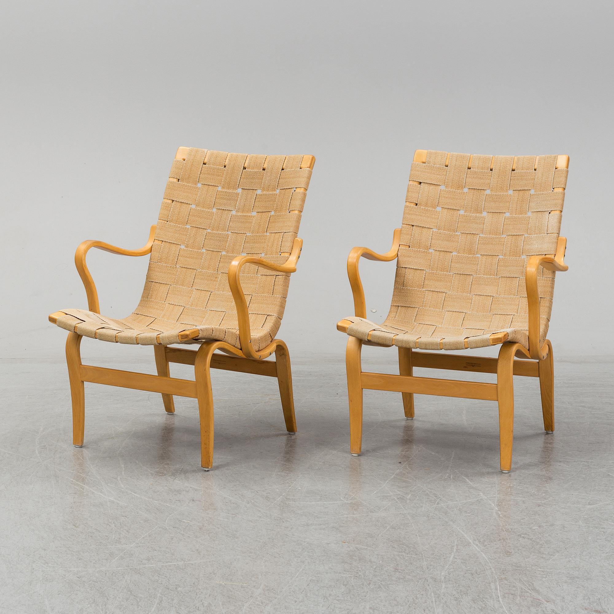 A pair of 'Eva' easy chairs by Bruno Mathsson, Firma Karl Mathsson, Värnamo 1973.