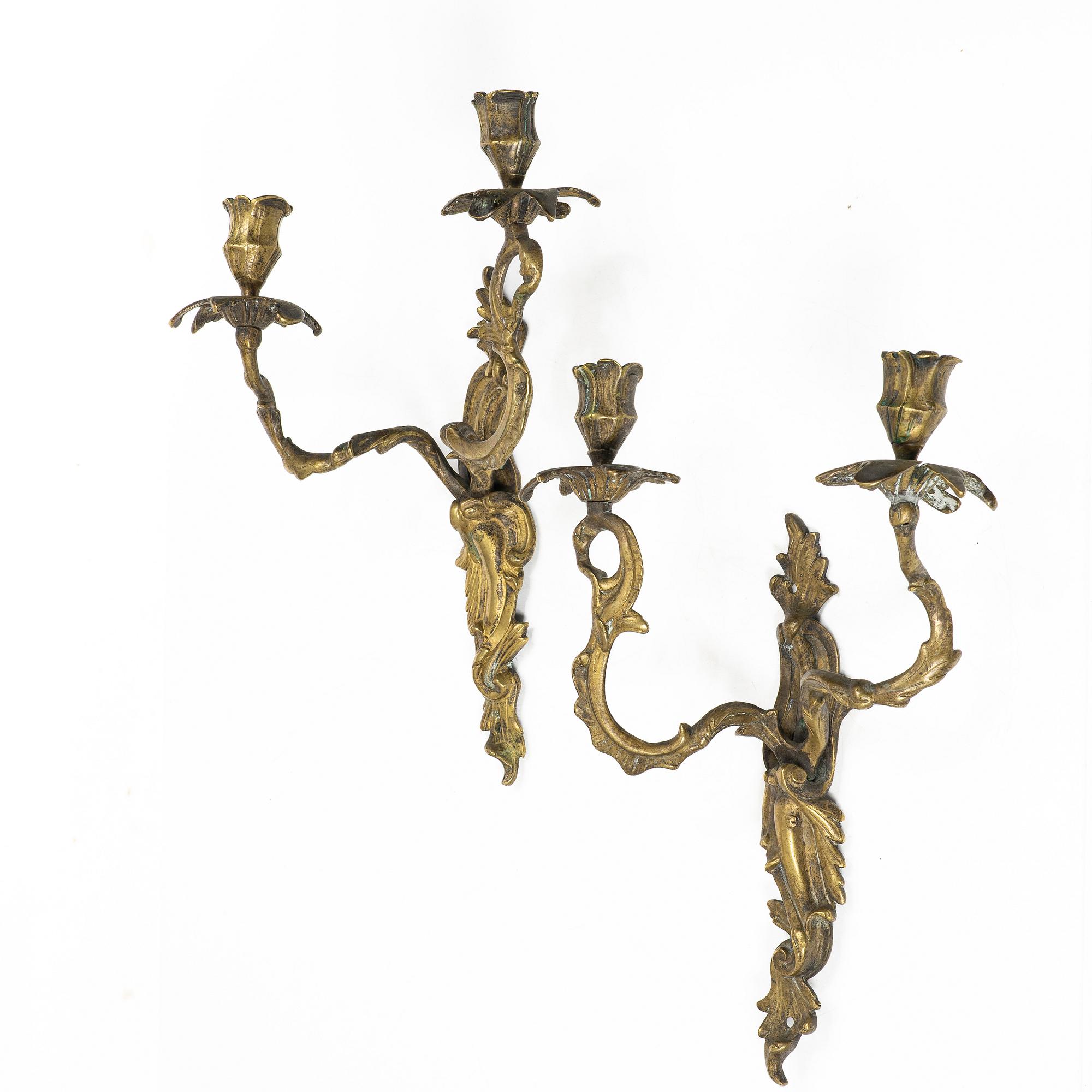 A pair of Rococo style wall sconces, 19th century.