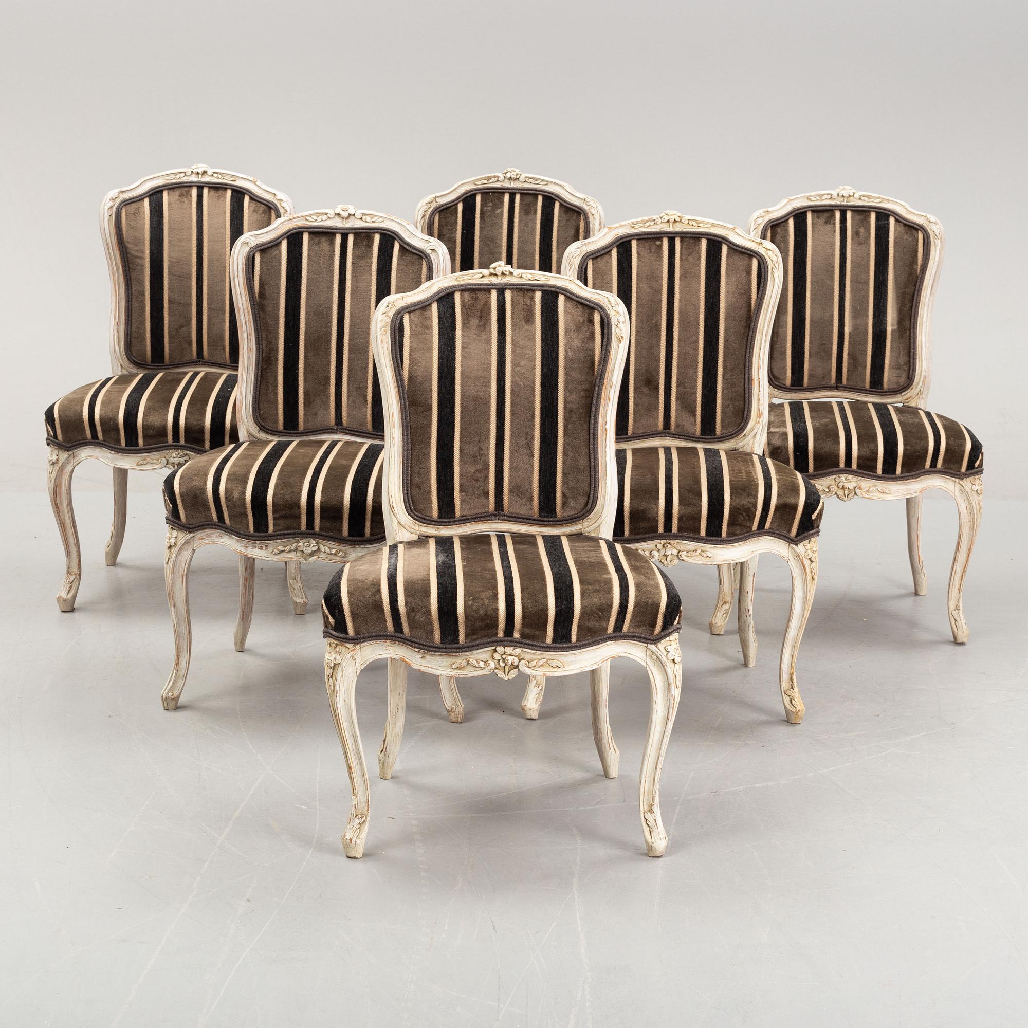 A matched set of six painted french rococo chairs, mid 18th Century.