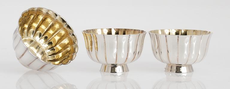 A set of three Bulgari silver bowls.