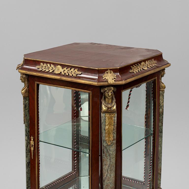 An Empire style cabinet, mid 20th Century.