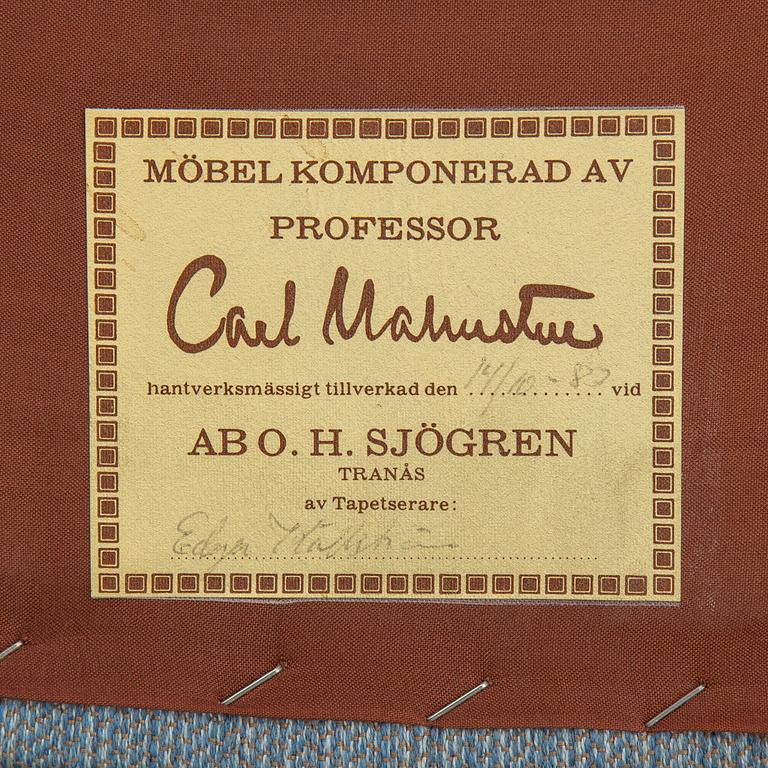 A second half of the 20th Century armchair by Carl Malmsten.