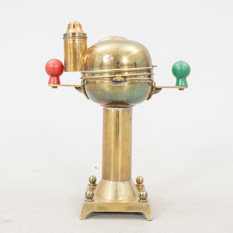 An 19th/20th century brass binnacle.